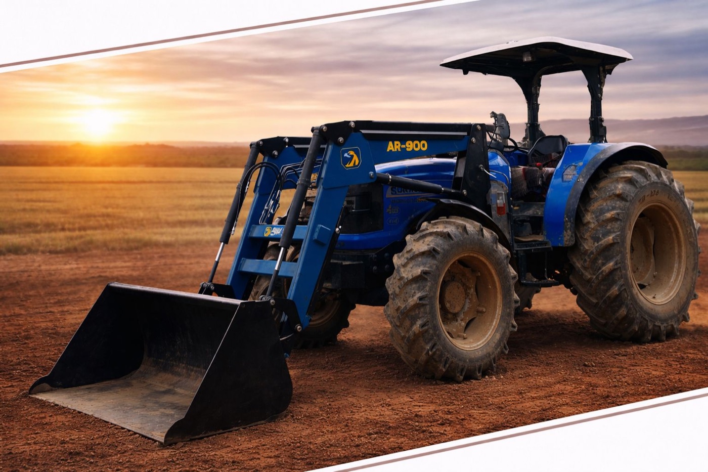 Tractor con cargadora frontal Agrindsa AR-900 trabajando en campo al atardecer